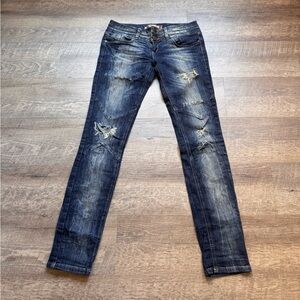 Distressed Dark Blue Jeans